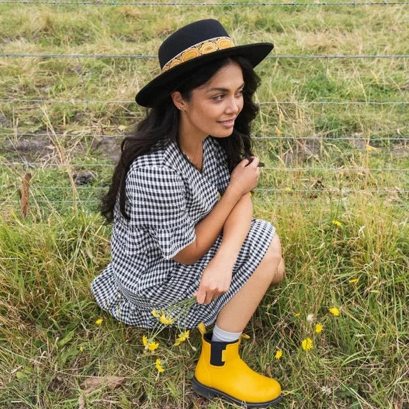 Mustard yellow top rain boots